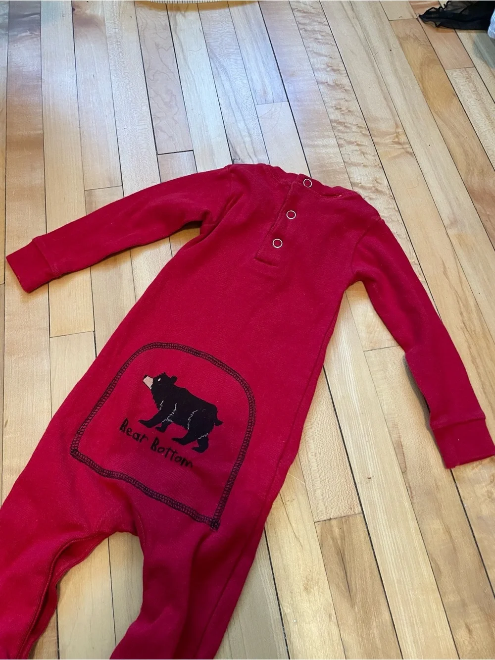 Lazy One Bear Bottoms red cotton baby onesie with black bear graphic Flap Jack